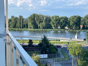 Z widokiem na jezioro i garażem, Poznań